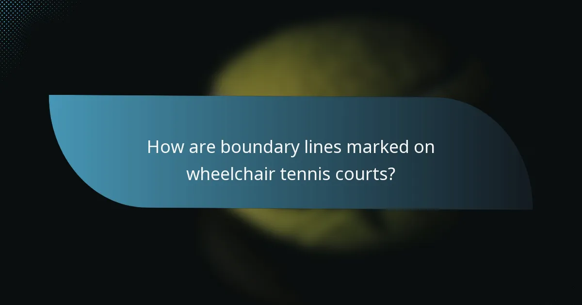 How are boundary lines marked on wheelchair tennis courts?